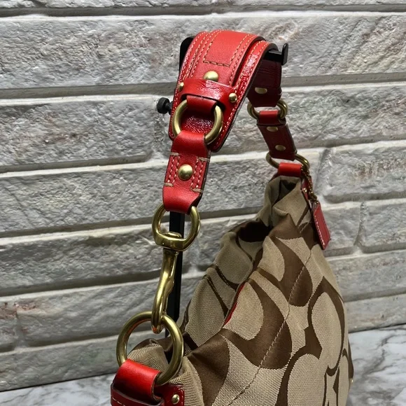 Coach Carly Signature Hobo Bag with red leather trim and gold-tone hardware. - Picture 6 of 14